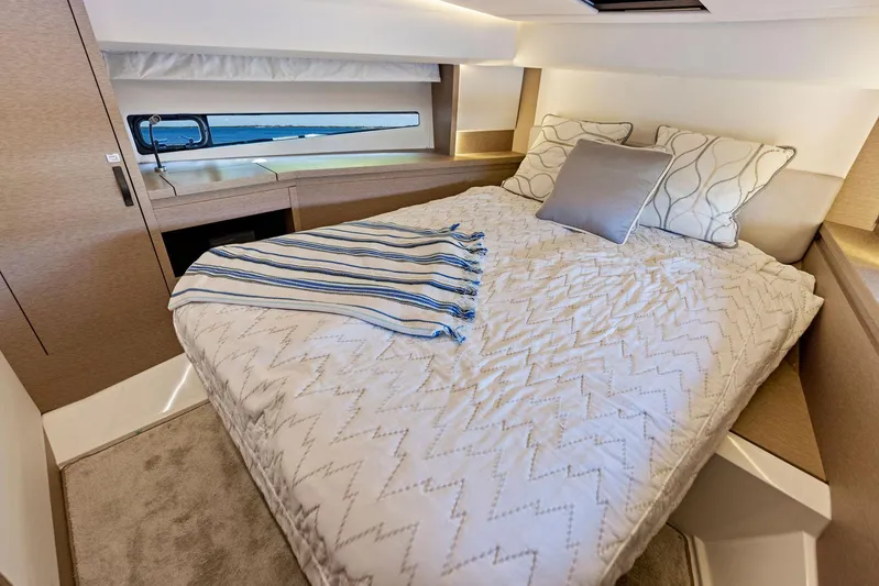  Yacht Photos Pics Luxurious bedroom in 2018 Prestige 460 yacht with cozy bedding and modern decor.