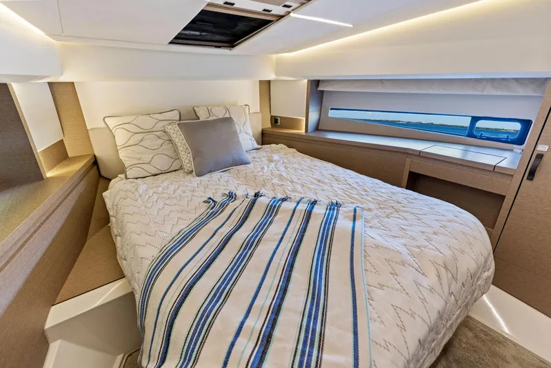  Yacht Photos Pics Prestige 460 2018 yacht bedroom with modern decor and natural light.