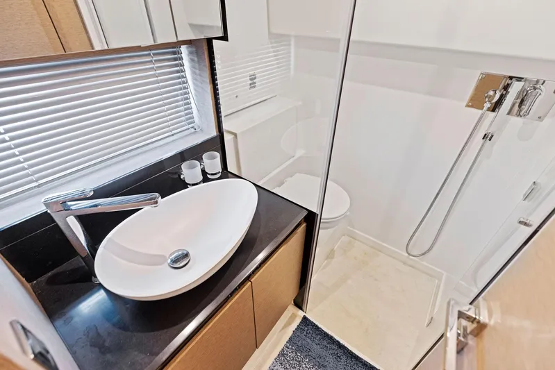  Yacht Photos Pics Modern bathroom in 2018 Prestige 460 yacht with sink and shower.