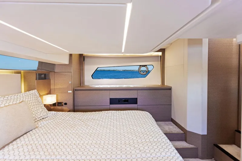  Yacht Photos Pics Luxurious bedroom interior of 2018 Prestige 460 yacht with modern design and ocean view.