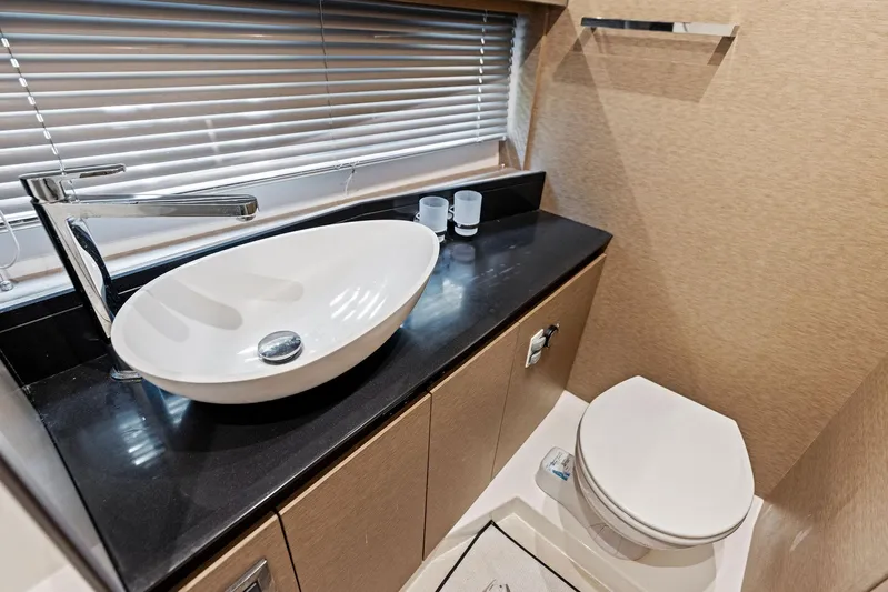  Yacht Photos Pics Modern bathroom in 2018 Prestige 460 yacht with sleek sink and toilet.
