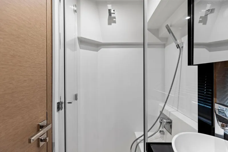  Yacht Photos Pics Modern bathroom in 2018 Prestige 460 yacht with glass shower and sleek fixtures.