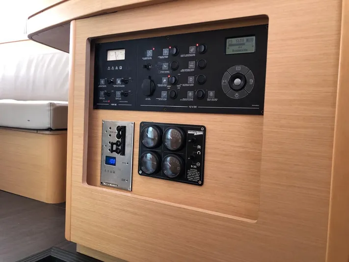 Darwin Yacht Photos Pics Control panel of a 2020 Lagoon 42 catamaran with various switches and gauges.