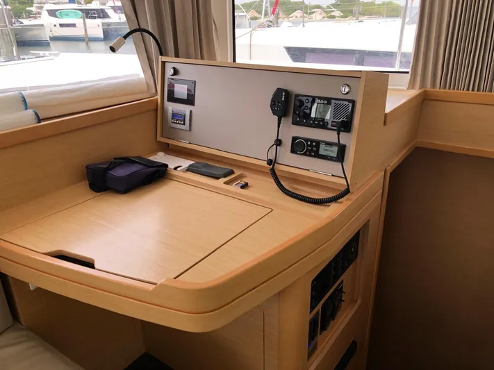 Darwin Yacht Photos Pics Navigation station on a 2020 Lagoon 42 catamaran with communication equipment.