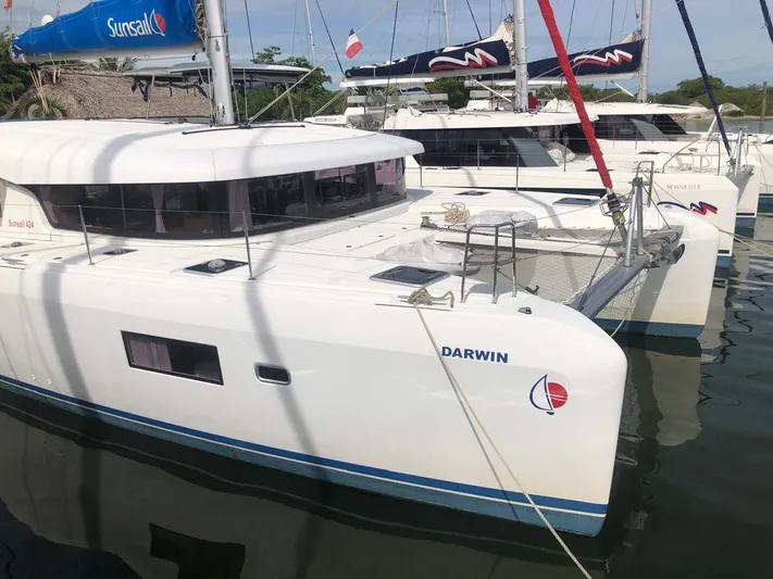 Darwin Yacht Photos Pics 2020 Lagoon 42 catamaran named Darwin docked at a marina.