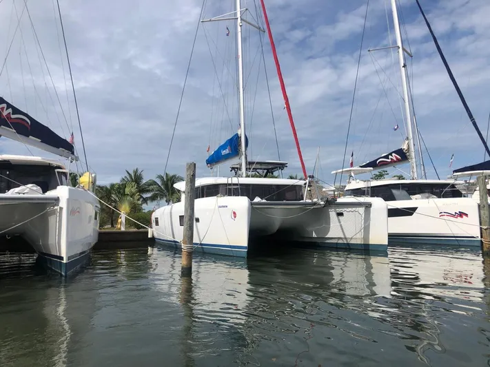 Darwin Yacht Photos Pics 2020 Lagoon 42 catamarans docked at a marina.