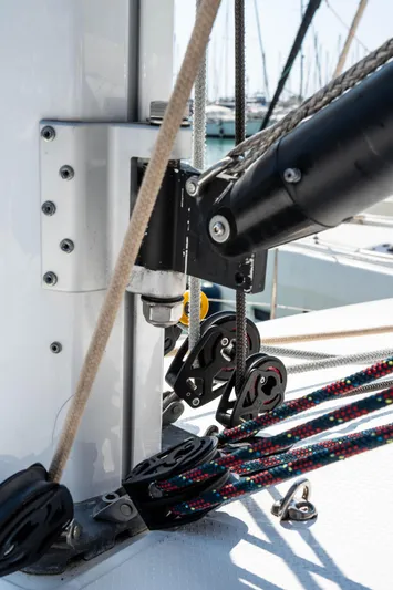  Yacht Photos Pics Close-up of 2023 Fountaine Pajot Isla 40 sailboat rigging and pulleys.