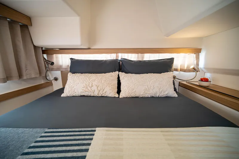  Yacht Photos Pics Luxurious bedroom interior of 2023 Fountaine Pajot Isla 40 catamaran.
