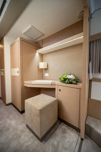  Yacht Photos Pics Luxurious interior of 2023 Fountaine Pajot Isla 40 yacht with elegant wood finish and seating.