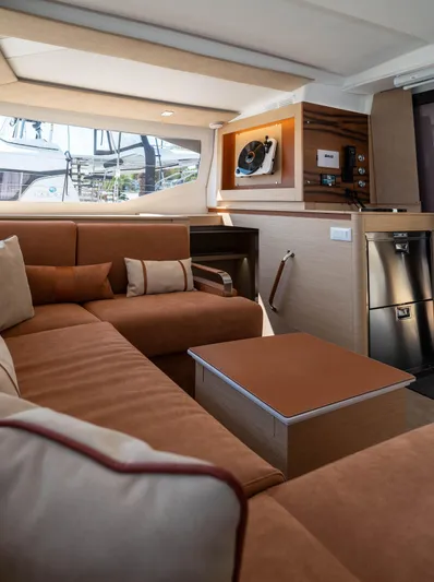  Yacht Photos Pics Luxurious interior of 2023 Fountaine Pajot Isla 40 catamaran with elegant seating and modern design.