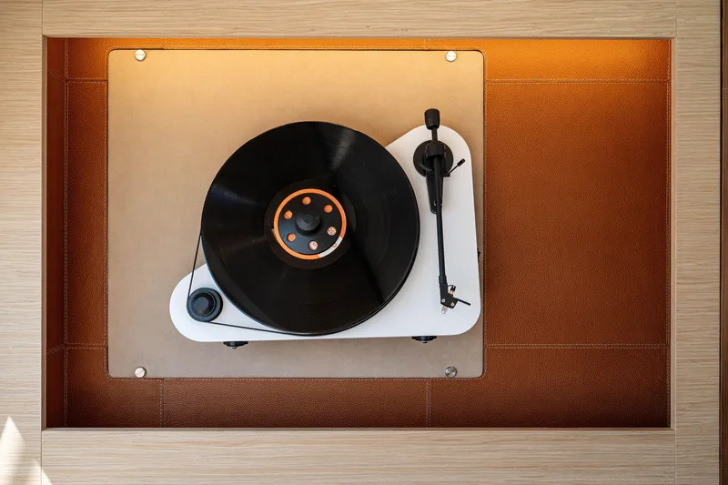  Yacht Photos Pics Turntable on Fountaine Pajot Isla 40 yacht, 2023 model, with elegant wood and leather finish.