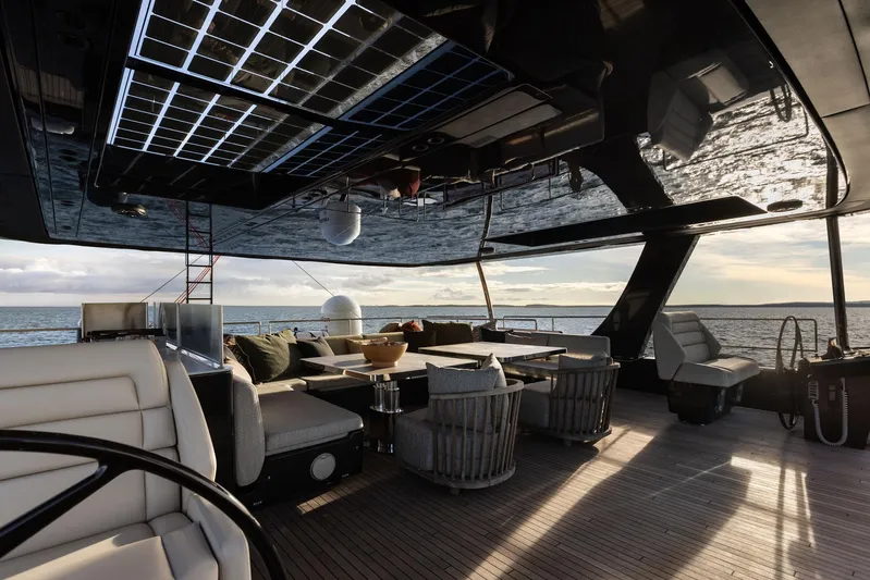 Otoctone Yacht Photos Pics Luxurious 2024 Sunreef 80 sailing yacht interior with elegant seating and ocean view.