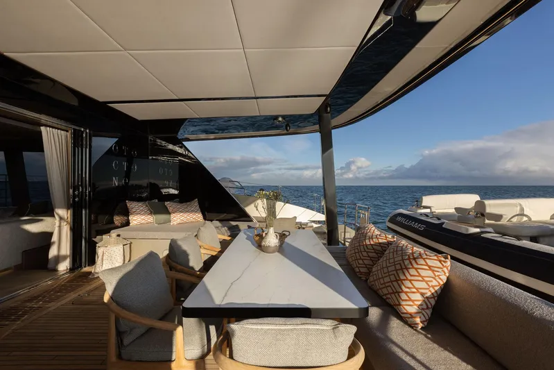 Otoctone Yacht Photos Pics Luxurious Sunreef 80 sailing yacht deck with elegant seating, ocean view, 2024 model.