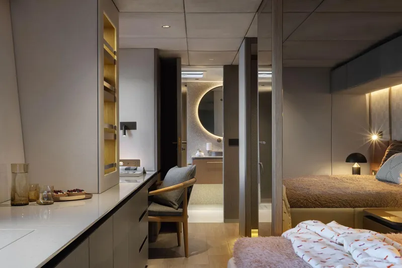 Otoctone Yacht Photos Pics Luxurious interior of 2024 Sunreef 80 sailing yacht, featuring modern bedroom and elegant bathroom.