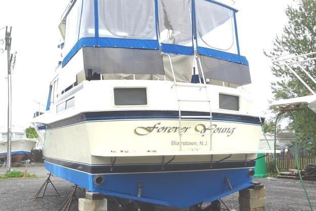 1985 Chris-Craft 426 Catalina boat named "Forever Young" in Blairstown, NJ, on dry dock.