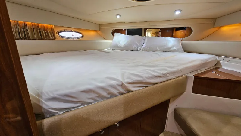  Yacht Photos Pics Luxurious cabin interior of 2007 Regal 3760 Commodore yacht with cozy bed.