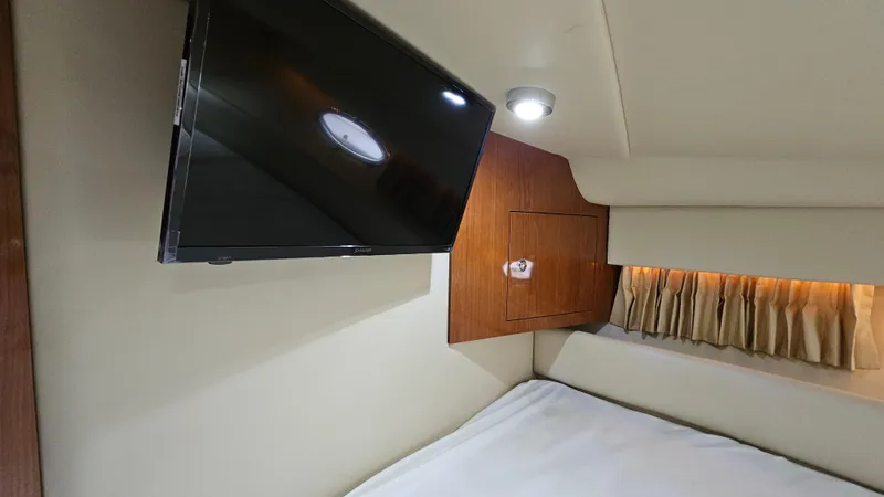  Yacht Photos Pics 2007 Regal 3760 Commodore cabin interior with TV and cozy bed.