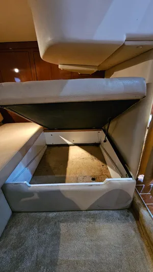  Yacht Photos Pics 2007 Regal 3760 Commodore interior storage compartment with open seat cushion.