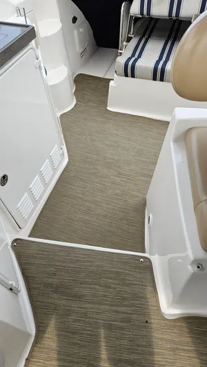  Yacht Photos Pics 2007 Regal 3760 Commodore interior with striped seating and beige flooring.