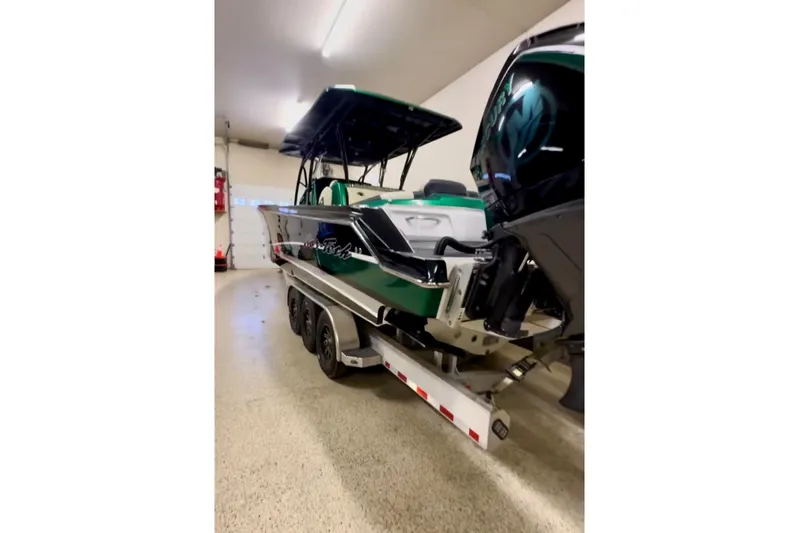  Yacht Photos Pics 2020 Nor-Tech 390 Sport Center Console boat on trailer in indoor storage.