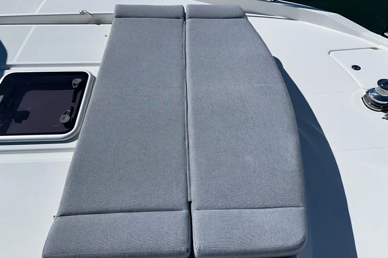 Mer Sea Yacht Photos Pics Sunbed on 2021 Beneteau Swift Trawler 41 Fly deck, featuring sleek design and comfort.