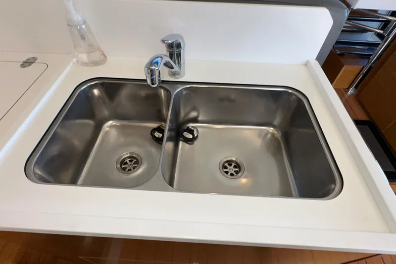 Mer Sea Yacht Photos Pics Stainless steel double sink in 2021 Beneteau Swift Trawler 41 Fly kitchen.