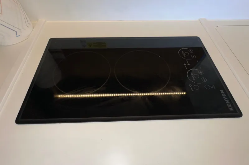 Mer Sea Yacht Photos Pics Kenyon cooktop on 2021 Beneteau Swift Trawler 41 Fly yacht kitchen counter.