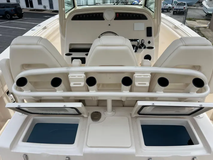  Yacht Photos Pics 2025 Grady-White Canyon 336 boat interior with rod holders and storage compartments.
