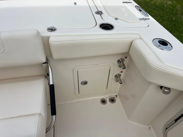  Yacht Photos Pics 2025 Grady-White Canyon 336 boat interior with seating and storage compartment.