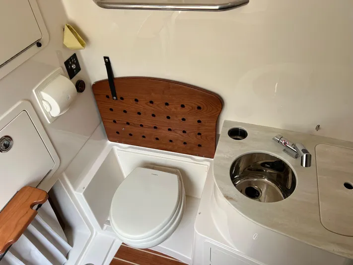  Yacht Photos Pics 2025 Grady-White Canyon 336 boat bathroom with toilet and sink.