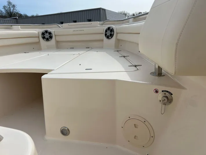  Yacht Photos Pics 2025 Grady-White Canyon 336 boat interior with seating and speakers.