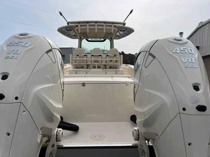  Yacht Photos Pics 2025 Grady-White Canyon 336 boat with twin 450 V8 engines, rear view.