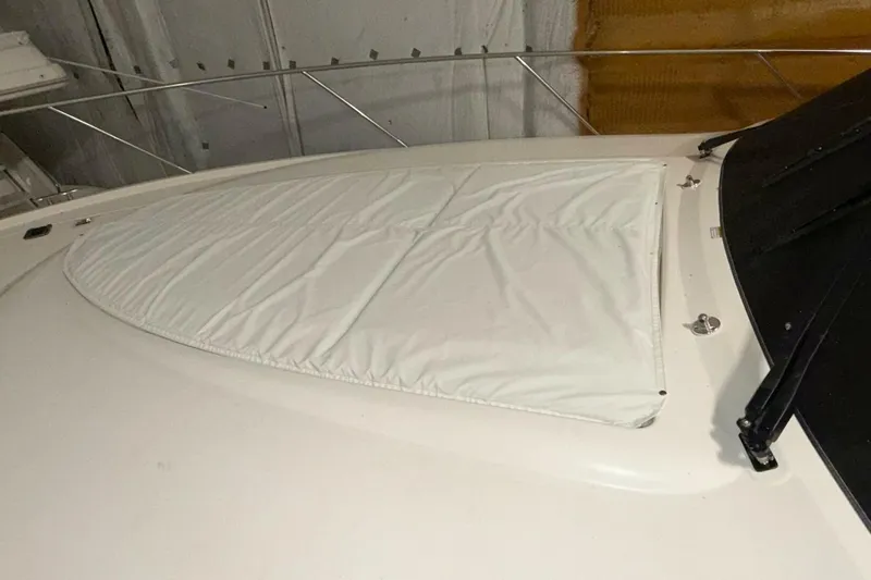 Strange Magic II Yacht Photos Pics 2018 Tiara Yachts C44 Coupe with covered deck area in storage.