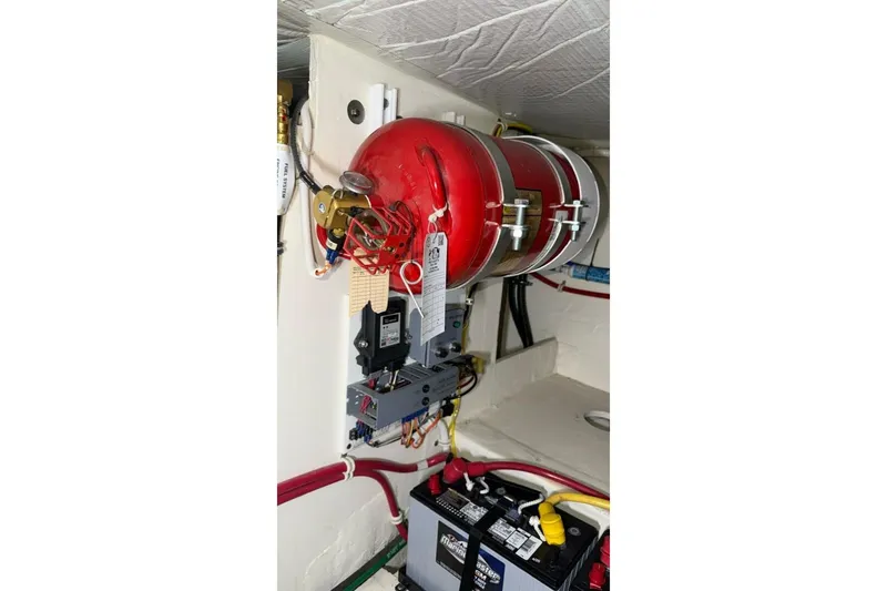 Strange Magic II Yacht Photos Pics Engine room of 2018 Tiara Yachts C44 Coupe with fire suppression system.