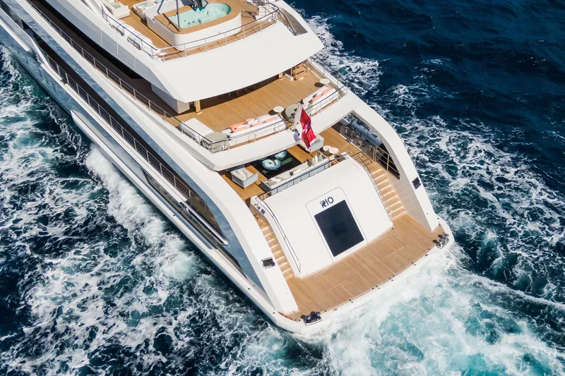 Rio Yacht Photos Pics Luxurious 2022 CRN 62m yacht cruising with jacuzzi and sun deck.
