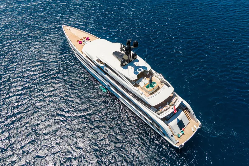 Rio Yacht Photos Pics Luxurious 2022 CRN 62m yacht cruising on open blue sea.