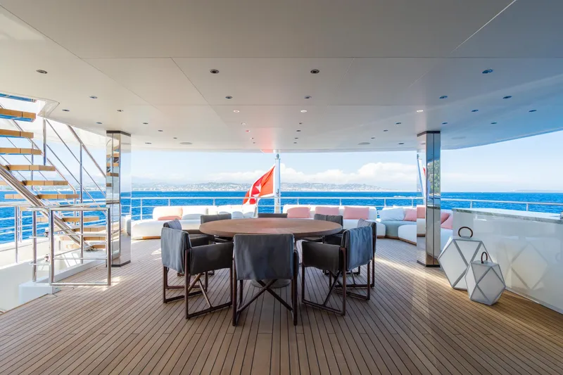 Rio Yacht Photos Pics Luxurious 2022 CRN 62m yacht deck with elegant seating and ocean view.