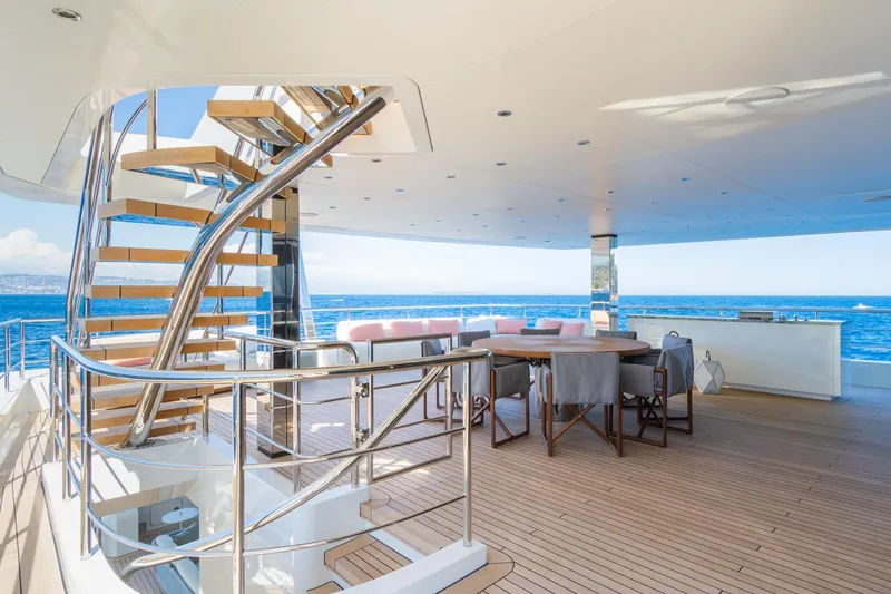 Rio Yacht Photos Pics Luxurious 2022 CRN 62m yacht deck with elegant seating and ocean view.