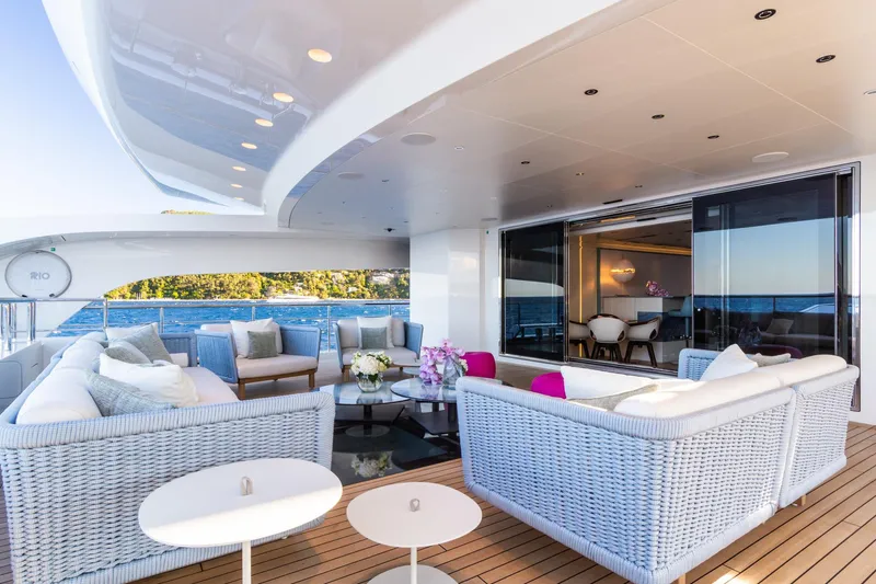 Rio Yacht Photos Pics Luxurious 2022 CRN 62m yacht deck with elegant seating and ocean view.