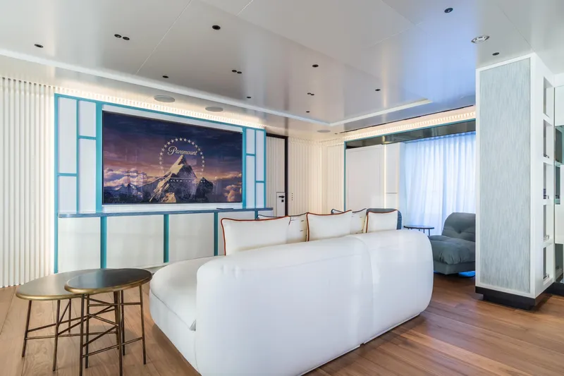Rio Yacht Photos Pics Luxurious yacht interior with modern seating, large screen, and elegant decor, CRN 62m, 2022.
