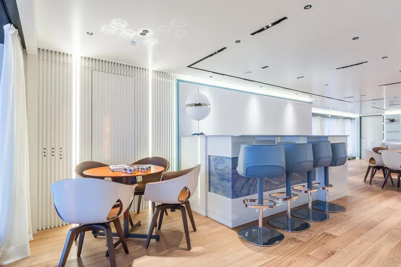 Rio Yacht Photos Pics Luxurious CRN 62m yacht interior, featuring modern bar and seating area, 2022 model.