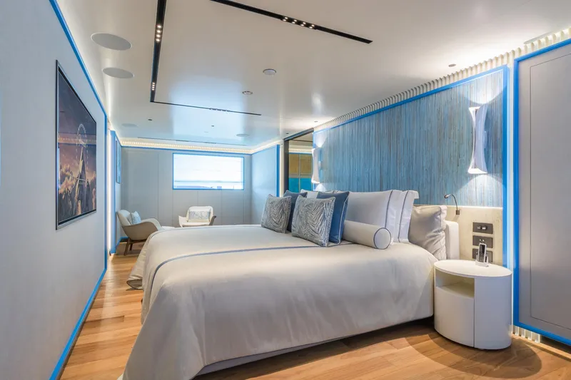 Rio Yacht Photos Pics Luxurious bedroom interior on 2022 CRN 62m yacht, featuring modern design and elegant furnishings.