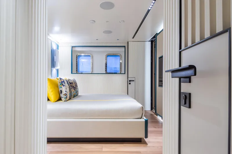 Rio Yacht Photos Pics Luxurious CRN 62m yacht bedroom interior, 2022 model, featuring modern design and vibrant accents.
