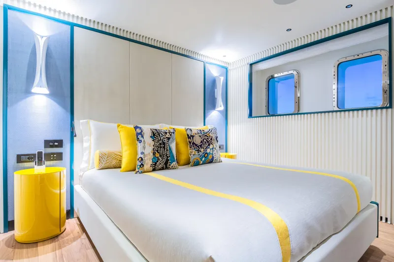 Rio Yacht Photos Pics Luxurious CRN 62m yacht bedroom, modern design, vibrant yellow accents, 2022 model.