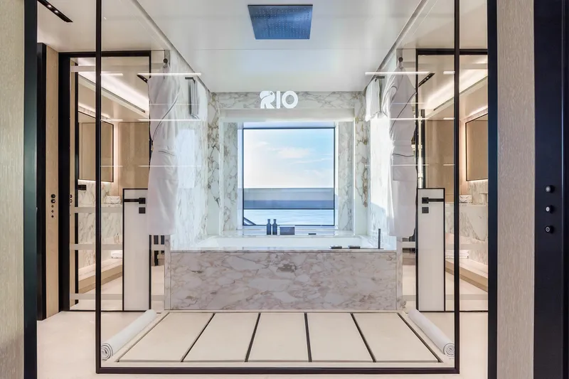 Rio Yacht Photos Pics Luxurious CRN 62m yacht bathroom with marble decor and ocean view, 2022 model.