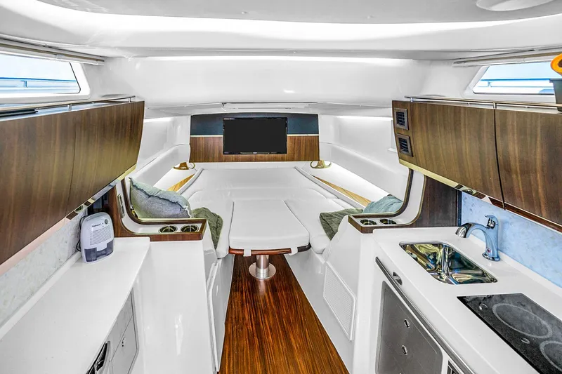  Yacht Photos Pics Luxurious interior of 2025 Grady-White Canyon 456 boat with modern amenities.
