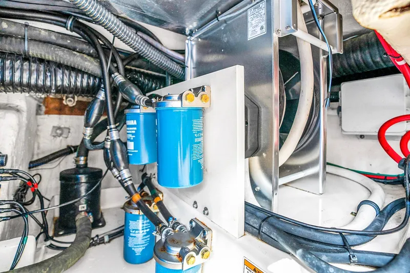  Yacht Photos Pics Engine compartment of 2025 Grady-White Canyon 456 boat with Yamaha filters and wiring.