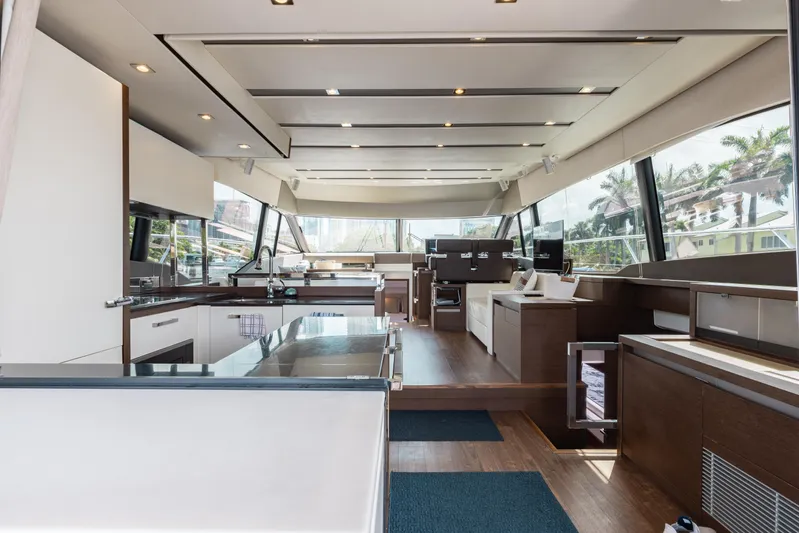 Knightlife Yacht Photos Pics Luxurious interior of a 2017 Prestige 630 yacht with modern design and panoramic windows.