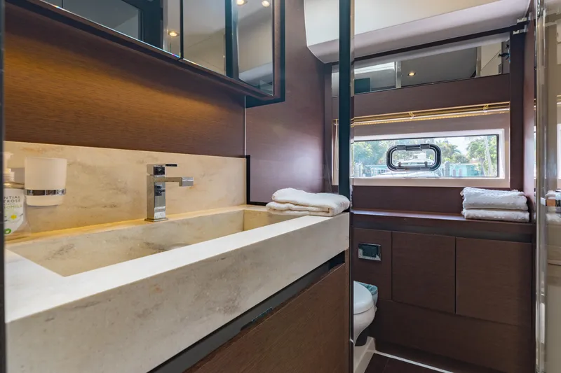 Knightlife Yacht Photos Pics Luxurious bathroom in 2017 Prestige 630 yacht with modern fixtures and elegant design.