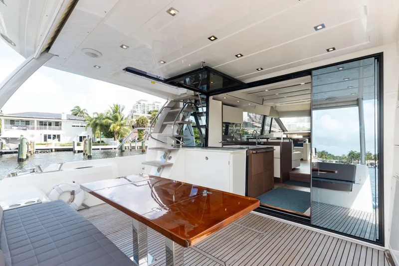 Knightlife Yacht Photos Pics Luxurious 2017 Prestige 630 yacht interior with sleek dining area and modern kitchen.